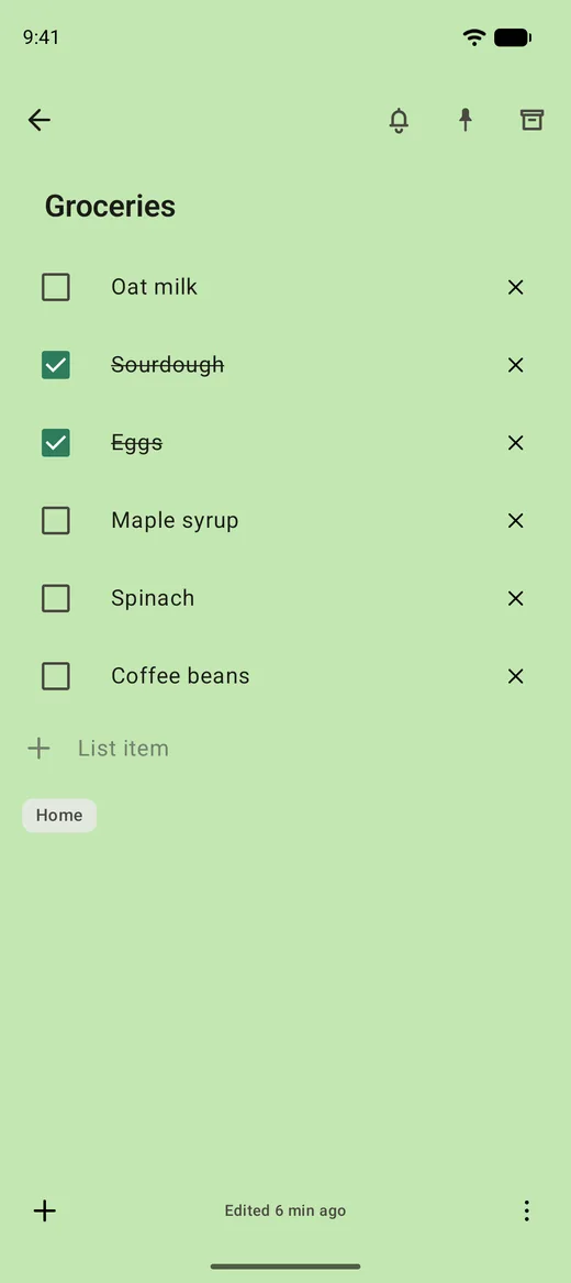 A grocery checklist open in Foliover with two items ticked off.